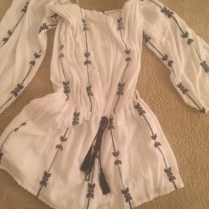 Trendy White romper with designs